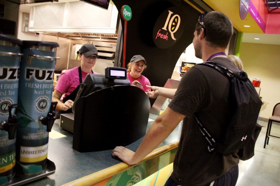 Kevin Brost / Arizona Daily Wildcat

Maxwell Trego orders food and beverages from IQ Fresh, located in the Student Union Memorial Center.