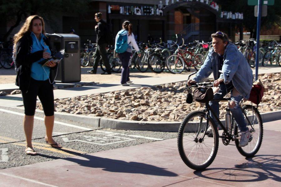 Kevin Brost / Daily Wildcat

Bike safety awareness is raised as pedestrians and bicyclists increasingly share the same populus areas of the UA Mall on Wednesday.