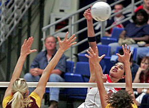 Arizona freshman outside hitter Whitney Dosty attempts a kill in Arizonas four-game loss to ASU Sept. 22 in McKale Center. After starting the conference season 0-3, it doesnt get any easier for the Wildcats with undefeated No. 3 UCLA and No. 4 USC in town this weekend.