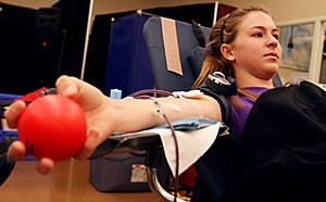 Pre-nursing freshman Sarah Conn gets her blood drawn yesterday at the Red Cross blood drive in the UofA Bookstore in the Student Union Memorial Center. The drive will continue Wednesday from 10 a.m. to 4 p.m. at all locations.