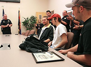 Jake Lacey / Arizona Daily Wildcat

Undecided freshman Pat Fuscaldo, Warren Maredith and Kevin Maeyama were recognized by the UAPD police chief for stopping a vehicle break in near fourth and highland, then helping police track down the suspects.