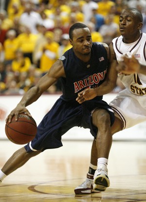UA guard Nic Wise tries to push past guard Jamelle McMillan in a 64-59 ASU win in Wells Fargo Arena in January.