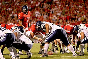 Sophomore quarterback Willie Tuitama surveys the defense in Arizonas opening game win over BYU at Arizona Stadium. Tuitama, who hasnt played since suffering his second concussion against UCLA on Oct. 7 may be available for the Nov. 4 game at Washington State.