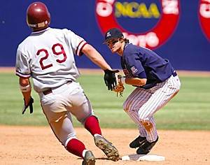 Arizona short stop Jason Donald throws to first over Stanfords Ryan Seawell during the sixth inning of Arizonas 12-3 win over Stanford, Sunday April 23, 2006 at Kindall/Sancet stadium. (Photo by Chris Coduto/Arizona Daily Wildcat)