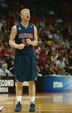 Arizona forward Chase Budinger celebrates during an 84-71 UA win against Utah on Thursday in AmericanAirlines Arena in Miami. Budinger and the rest of the Wildcats fought through lots of adversity to get to the Sweet 16, in part shedding the label that they were a soft team.