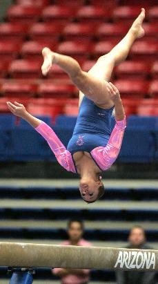 UA freshman Britnie Jones performs her routine on the beam during a loss to Stanford on Jan. 30 in McKale Center. The Gymcats have two meets this weekend as they host Brown and  Wisconsin-Stout on Friday night before a road meet against Texas Womens University on Sunday.