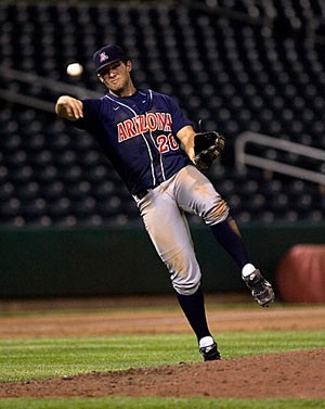 UA third baseman Brad Glenn slings the ball toward first base during a 10-6 win against New Mexico Tuesday night in Albuquerque, N.M. Glenn went 4-for-8 at the plate, scored two runs and notched one RBI in the two-game series as the Wildcats topped the Lobos 4-2 in yesterday afternoons series finale at Isotopes Park.