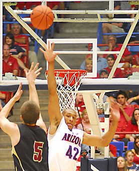 UA forward Jamelle Horne (42) defends a shot during Arizonas 68-50 win over Concordia Sunday in McKale Center. Horne, a freshman, will join the Wildcats starting lineup for tonights 7 p.m. exhibition game against Team Georgia.