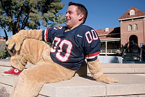UA alumnus Kirk Sibley is a legendary Wilbur who started 10 years ago when he was an undergraduate at the UA. His shoes, which he still has, have been to the mens basketball National Championship game in 1997 and through a 12-1 football season in 1998. 