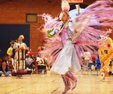 Shaneeshz Mountainsheep, a member of the Navajo/Crow tribe, dances in a competition during the Powwow at Bear Down Gym Saturday evening. Competition winners received prize money. Traditionally, however, prizes included blankets, horses, and other items of value.
