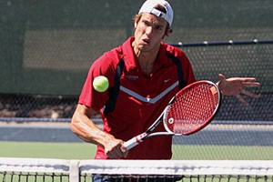 Arizona senior Claudio Christen backhands the ball in a 6-4, 6-3 loss to UCLA senior Harel Srugo at the Robson Tennis Center on Friday. The Wildcats lost to the Bruins as a team 5-2 and were shut out by USC 7-0 Saturday.