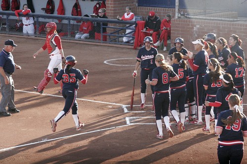Ernie Somoza / Arizona Daily Wildcat

Arizona softball left fielder Brittany Lastrapes trots toward home plate as her teammates celebrate after one of her three homeruns during the Wildcats