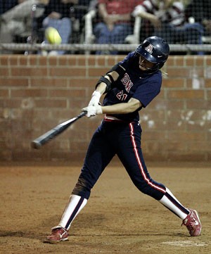Arizona designated player Stacie Chambers takes a swing in the Wildcats doubleheader sweep over Marshall at Hillenbrand Stadium on March 26. Chambers battled back from brain injuries following getting hit in the face with a foul ball last fall to become one of Arizonas most reliable hitters.