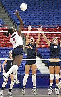 Arizona outside hitter Tiffany Owens leaps up for one of her 17 kills in a 3-2 loss to No. 9 California in McKale Center on Oct. 19. The freshman 