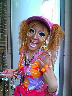 This Japanese ganguro girl may look like a ripoff of Toni Basil, but shes really just following a fashion trend that encourages girls to dress American. This movement is an inspiration to painter Iona Rozeal Brown, who mixes hip-hop images with traditional Japanese woodblock prints. 