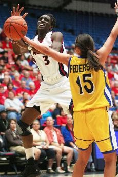 Arizona forward Ify Ibekwe drives toward the basket during a 54-47 Wildcat win against UC-Santa Barbara on Nov. 23, 2008 in McKale Center. Ibekwe leads the Pac-10 in rebounds per game and will lead the Wildcats against USC tonight at 7. 