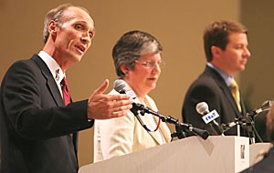 Libertarian candidate Barry Hess, left, argues his point during the gubernatorial debate last night with Democratic Gov. Janet Napolitano and Republican candidate Len Munsil in the Student Union Memorial Center. The hour-long debate focused on childrens issues, families and education. 
