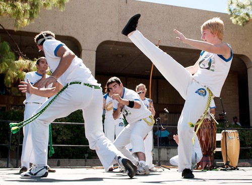 Garrett Macdonald, left, Alex Ramirez, cener, and Jennifer Myers, right, perform capoeira during Tucson Meet Yourself 2010.  Capoeira is taught at the student recreational center and is a mixture of martial arts, dance, and song.