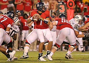 Quarterback Willie Tuitama looks for an open receiver in Arizonas 16-13 win over Brigham Young Saturday at Arizona Stadium. After completing just 19-of-39 passes in the season opener, Tuitama will try to lead the Wildcats to an upset at No. 8 Louisiana State tomorrow.