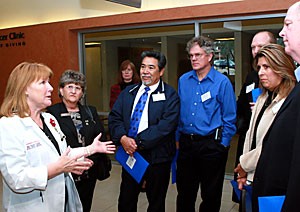 Dr. Patti Stumbo guides members of the Arizona Legislature on a tour through the new Peter and Paula Fasseas Cancer Clinic on Friday. Stumbo is nurse manager at the Arizona Cancer Center, which has the lowest state budget of any cancer center in the nation.