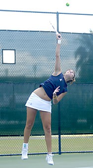 UA senior Kasia Jakowlew serves during doubles play Friday at Robson Tennis Center. Jakowlew contributed to a doubles win and won her singles match to help the Wildcats beat Oregon 6-1.