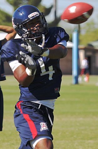 The University of Arizona football team takes part in morning practice Thursday, Aug. 19, 2010, at the Rincon Vista Sports Complex in Tucson, Ariz. The Wildcats look to reach a bowl game for the third season in a row with quarterback Nick Foles at the helm.
(Photograph by Mike Christy)