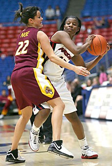 Arizona guard Joy Hollingsworth tries to avoid ASUs Jill Noe during the Wildcats 59-54 loss to the Sun Devils Feb. 24 at McKale Center. Hollingsworth faces what may be her last game in Arizona red and blue at the Pac-10 Confernce tournament tonight against Oregon State.