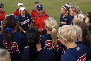 Arizona head coach Mike Candrea preps his players before yesterdays 10-inning win over Tennessee. Candrea will be taking a 15-month leave of absence to coach the USA Softball team in the 2008 Olympics in Beijing starting in January.