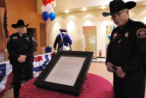 Valentina Martinelli/Arizona Daily Wildcat

Arizona Rangers Vinson Holck, right, and Steve Nekolek stand guard over one of the 26 original first printings by John Dunlap of the Declaration of Independence while displayed in the Arizona History Museum February 21 and 22, 2010.