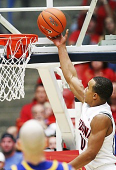 UA guard Jerryd Bayless rises for a layup during Arizonas 81-62 win over Missouri-Kansas City on Monday in McKale Center. Bayless and the Wildcats are not overlooking Adams State tonight at home. 