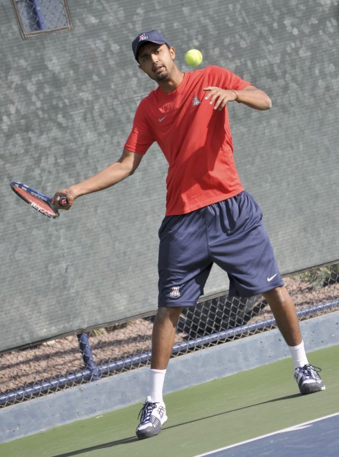 Alex Kulpinski / Daily Wildcat

UA Tennis newest addition, Sumeet Shinde, practices his volley at the Robson Tennis Center on Saturday morning.