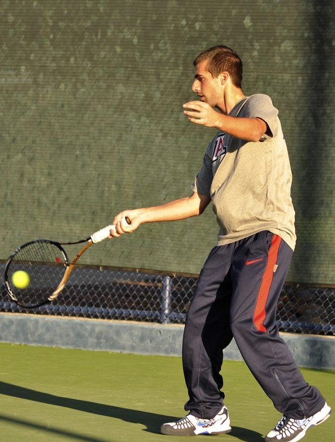 Alex Kulpinski / Daily Wildcat

Sebastian _____ takes some practice swings at Robson Tennis Center early Tuesday morning.  ______ is one of the newest additions to the Mens Wildcat Tennis Team.
