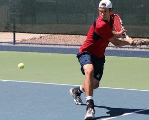 UA senior Claudio Christen prepares to backhand the ball in a match against UCLA at the Robson Tennis Center on April 11. Christen is one of four departing seniors on the UA mens tennis team.