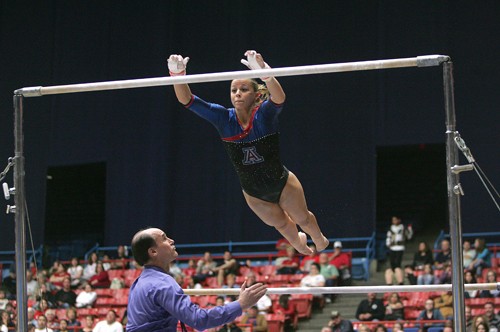 Mike Christy / Arizona Daily Wildcat

The UA gymnastics team ended their home season with a third straight win against No. 24 Minnesota 196.175 to 193.700 Friday night in McKale. Senior Sarah Tomczyk placed second overall in last home meet of her career.
