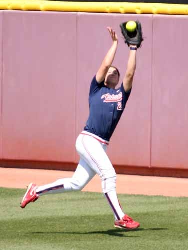 Arizona softball center fielder Lauren Schutzler catches a fly ball during the Wildcats? 14-2 victory over Arizona State on Saturday in Tempe. 
