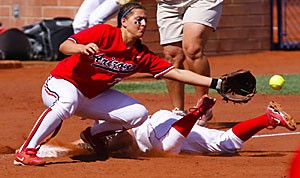 Third baseman Jenae Leles cant tag out an Ohio State runner during Arizonas 6-3 win over Ohio State May 19 at Hillenbrand Stadium. No. 2-seeded Arizona will face no.15-seed Louisiana State this weekend in the super regionals at Hillenbrand Stadium. 