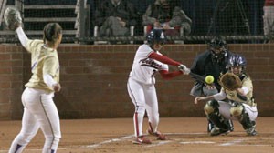 UA outfielder Brittany Lastrapes connects on a pitch in a 5-4 win over Washington at Hillenbrand Stadium on April 11. The Wildcats are holding walk-on tryouts on Sept. 15.