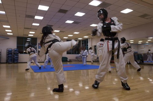 Casey Sapio / Arizona Daily Wildcat

Jessica Cox and Kurt Fluck practice sparring to prepare for an upcoming Tae Kwan Do tournament in the Rec Center in Tucson, Ariz. on Thurs, Sept. 17, 2009.