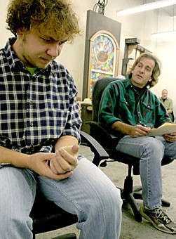 Kale Arhdt, left, and Eric Anson rehearse a scene from the play Thumbs.