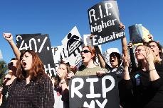 Students protest the legislatures proposed budget cuts to higher education outside the Arizona State Capitol Wednesday afternoon.