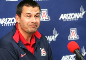 UA interim head coach Russ Pennell addresses the media on Wednesday in McKale Center. Pennell said he had no plans in changing Lute Olsons run-and-gun offense and zone defense.