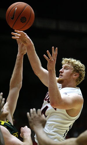 UA forward Chase Budinger releases the ball in the Wildcats 84-74 loss to Oregon on Jan. 5 in McKale Center. Budinger, who put his name into the NBA Draft this week, will leave the Wildcats with a thin roster if he decides to go pro.