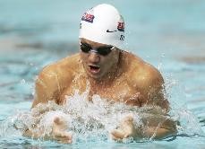 UA junior Marcus Titus takes a breath during an Arizona dual meet win against California on Jan. 23 at Hillenbrand Aquatic Center. This weekend the No. 4 mens and womens teams take on ASU in the final home meet of the season.