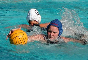 UA womens club water polo utility player Cami Kliner swoops in on the ball during the UC-Davis Invitational March 16 at Schall Aquatic Center. Arizona placed fourth in last weekends 2008 National Collegiate Club Water Polo Championships, tying the squads highest-ever finish.