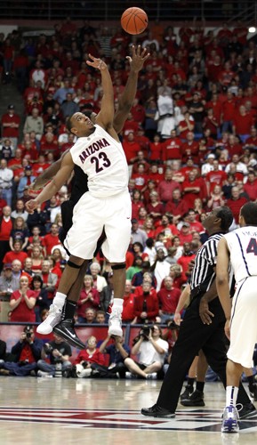 Mike Christy / Arizona Daily Wildcat

Nic Wise iced the game in double-overtime with a layup with just over one second left to beat the USC Trojans 86-84 Saturday in McKale Center. It was Senior Day for the Cats as Nic Wise played his last game in McKale.
