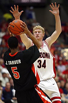 UA forward Chase Budinger defends OSU guard Josh Tarver during the Wildcats 83-72 win last year in McKale Center. If Arizona hopes to win its 26th straight game against the Beavers in Tucson, Budinger will likely have to carry much of the scoring load with leading scorer Jerryd Bayless injured.
