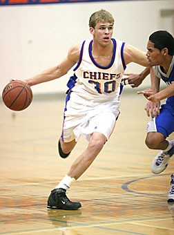Arizona basketball signee Zane Johnson, a Thunderbird High School senior, drives in Thunderbirds 74-43 win over Sinagua Dec. 19 at his Phoenix high school. Along with fellow signee Jerryd Bayless, who played on Johnsons club team, the Wildcats have two players in their incoming recruiting class from the Phoenix area.