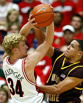UA forward Chase Budinger backs away from intense pressure from ASU guard Jerren Shipp during the Wildcats 71-47 win over the Sun Devils in McKale Center last year. Buoyed by McDonalds All-American guard James Harden, who leads the Pac-10 in steals, ASU could be on the verge of making this lopsided series more of a rivalry.
