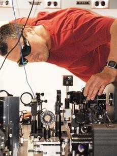Associate Research Professor of Optical Sciences, examines the optics used to measure the intensity of the lasers pulse. Bending a shore pulse laser beam has implications for particle acceleration and lighting control.