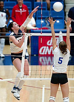 Opposite hitter Randy Goodenough drives the ball over the net during Arizonas sweep of Cal-State Bakersfield on Friday morning in McKale Center. oodenough, who was named the tournaments MVP, posted a match-high 25 kills against UC Irvine later that day.